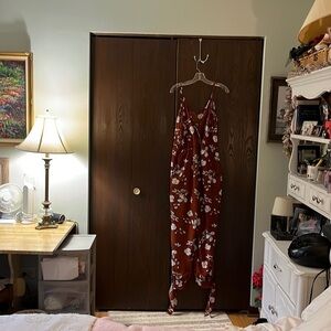 NA clay/ white flower patterned jumpsuit. Size XL.